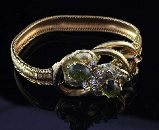 A mid 20th century continental gold, cabochon green tourmaline? and diamond bracelet,